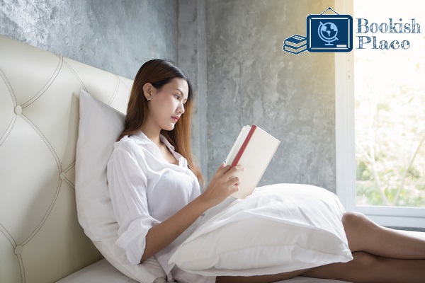 An Asian Woman Reading Book in Bed Using Best Backrest for Reading in Bed