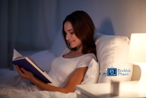 Woman Reading at Bedtime Using Best Backrest for Reading in Bed